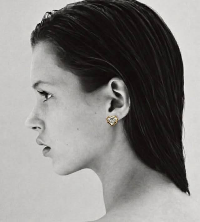 Black-and-white portrait wearing Willow’s Lab Heart Studs