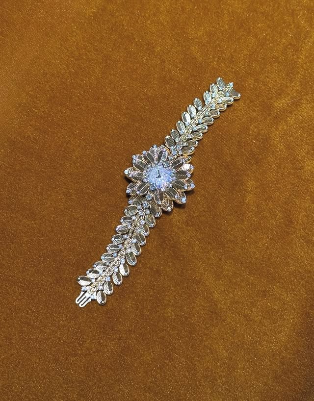Diamond leaf jewellery piece glowing on ochre velvet, published by Willow’s Lab